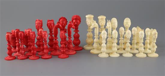 A mid 19th century Macao red stained and natural ivory figural chess set, kings 3.5in.